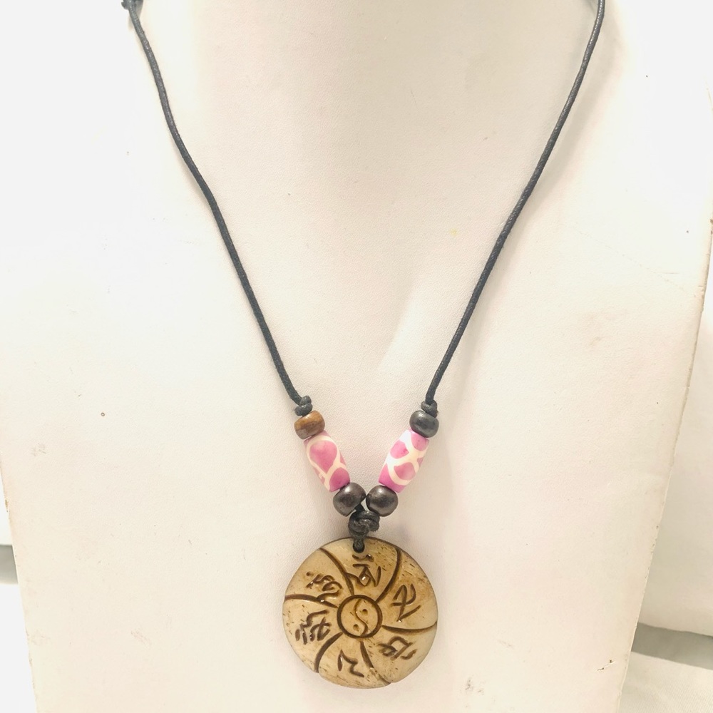 Tibetan Buddhist mantra sign pendent necklace.